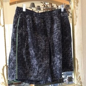 Lululemon shorts. Charcoal/gray print and green trim. Size L
